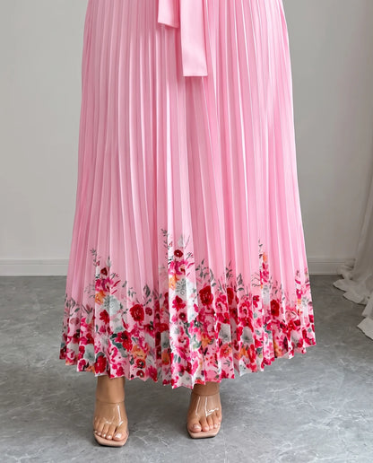 Charlie Floral Pleated Maxi Dress — pleated hem with floral border