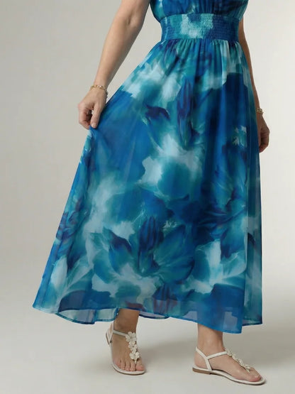 Thyra Gathered Halter Maxi Dress — skirt in movement